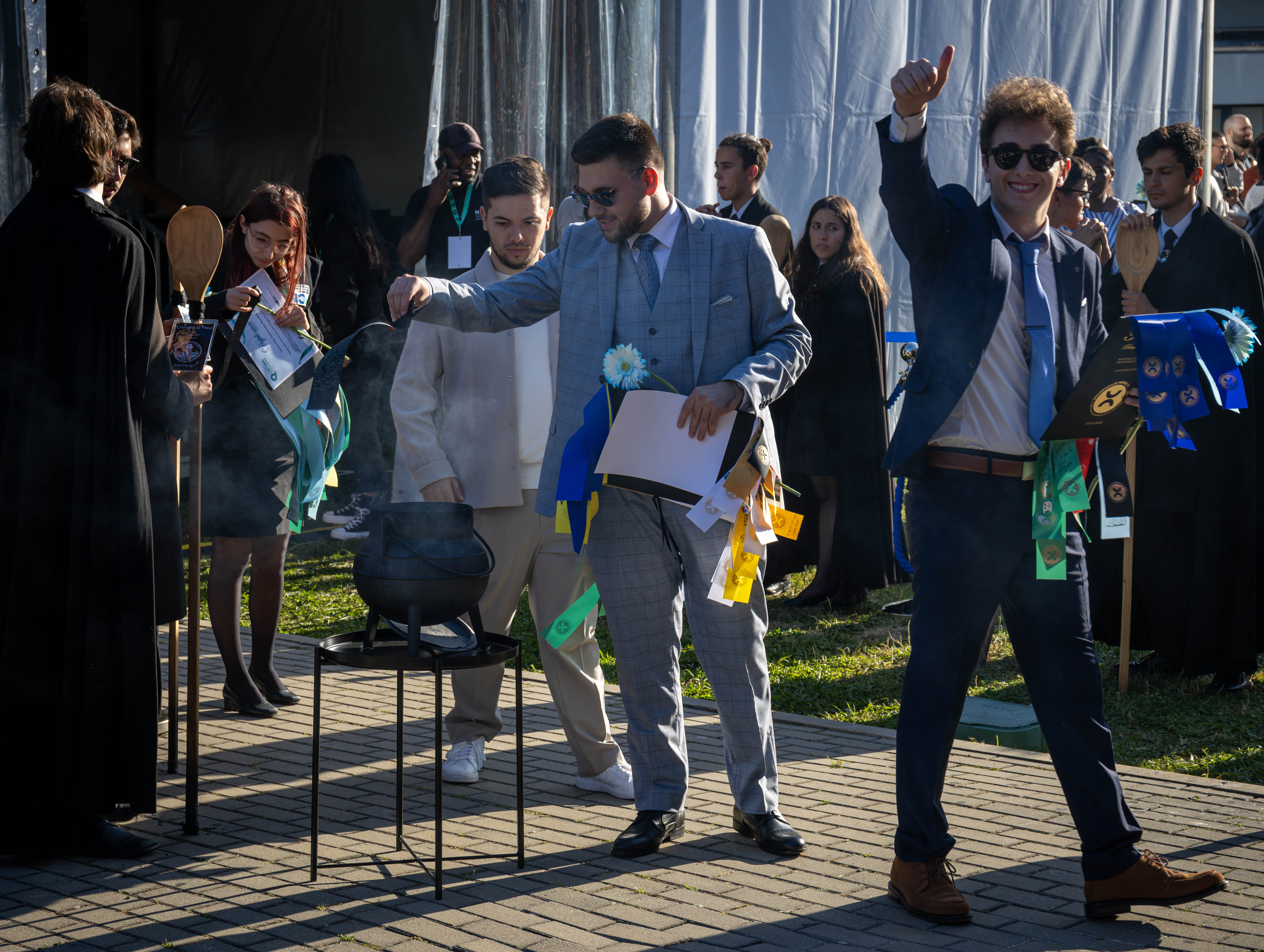 Photo of a student burning his black ribbon