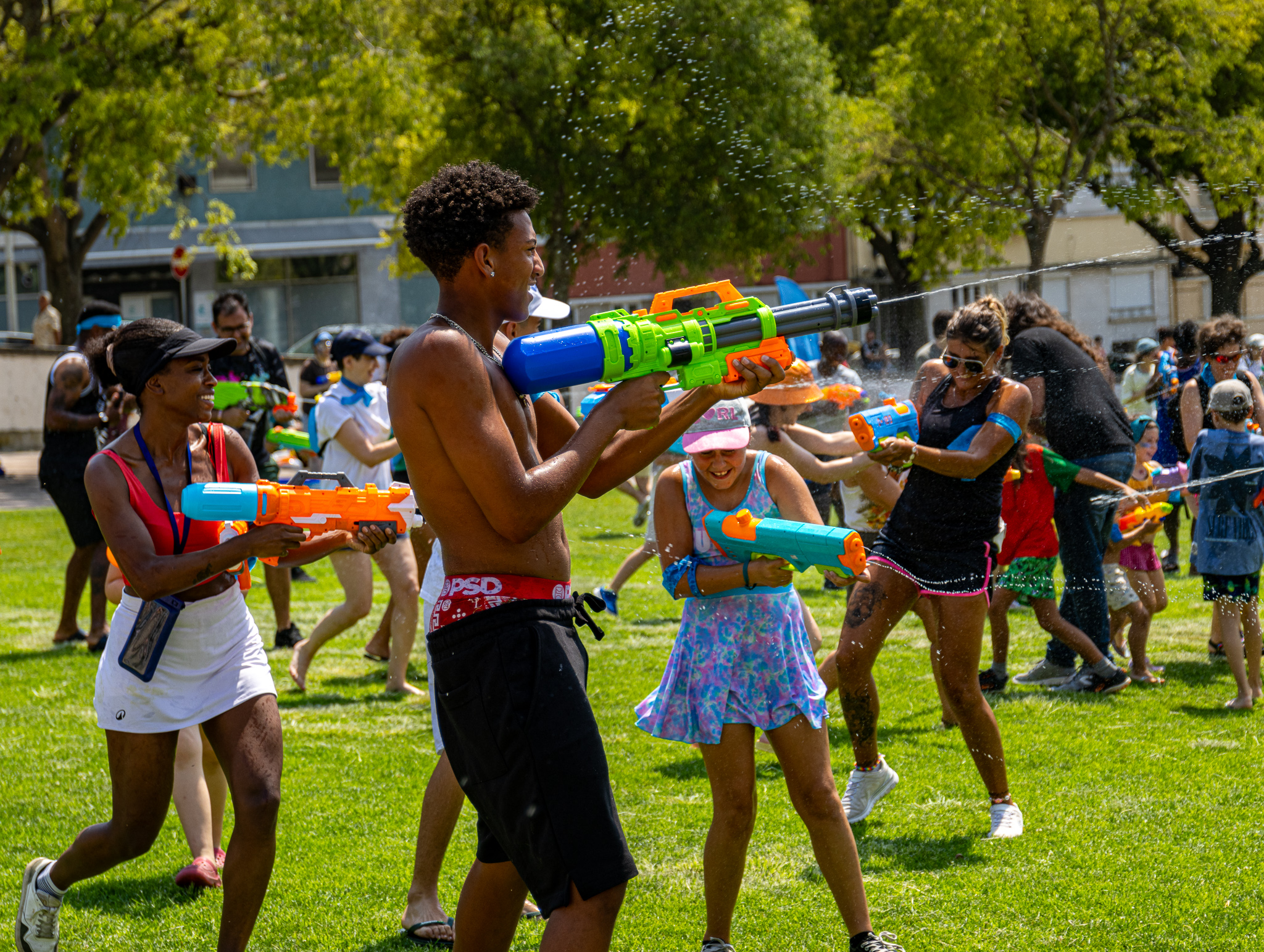 Man shooting his water gun